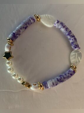 Beautiful Beaded Stretch Bracelet with Pearl Accents and Leaf Charms.